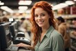 a photo of a beautiful redhead female cashier smiling at the checkout scanning codes of products in a grocery store. Generative AI.