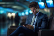 Business professional engrossed in smartphone at Airport