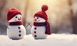 Winter holiday christmas background banner - Closeup of two cute knitted funny laughing snowmen with red wool hat and scarf, on snowy snow snowscape, illuminated by the sun..