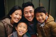 Asian Family of parents and 2 children happy smile face portrait