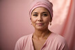 © Naveen - A unique and heartwarming depiction of a cancer survivor, captured in a studio setting against a backdrop of delicate pink tones, exuding strength and positivity.