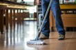 Man cleaning mopping a commercial restaurant kitchen floor. generative AI