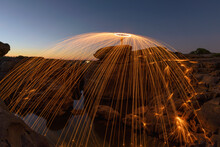 Person Spinning Wire Wool In Canyon, Sam Pan Bok, Ubon Ratchathani, Thailand