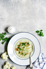 Wall Mural - Thick cauliflower soup. Top view with copy space.