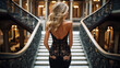 © dinastya - Back view of a young slender girl in an elegant black lace evening gown. Fashion industry, luxury designer dresses.