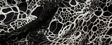 Closeup Of A Modern Lace Fabric With A Bold, Abstract Design. Its Unique Texture And Edgy Patterns Make It A Perfect Choice For Edgy And Avantgarde Fashion Pieces.
