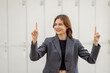 © David - Asian business woman standing in office for meeting and business woman happy Smiling woman executive manager, for working