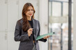 © David - Asian business woman standing in office for meeting and business woman happy Smiling woman executive manager, for working
