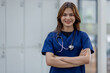 © David - Young Asian nurse or Female medical assistant in clinic
