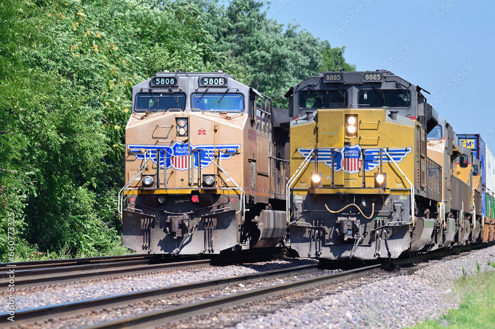 A single locomotive serving as a rear-train distributed power unit ...