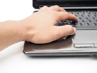 Human hands sitting in the workplace on a white work desk and typing on the keyboard of a laptop computer. business idea Isolated on a white background.