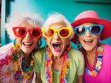 Fototapeta  - Happy and funny cool old three ladies wearing fashionable bright clothes. Happy and modern Senior women. 
