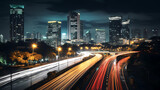 Fototapeta  - Time lapse photography of a busy road nighttime in Jakarta. Long Exposure Photography. Blurred cars light trails. Motion blur.