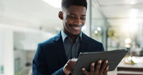 tablet, networking and businessman in the office typing a message on the internet or mobile app. dig