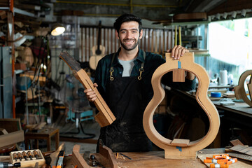 Wall Mural - Acoustic Guitar Luthier Smiling in Workshop Portrait