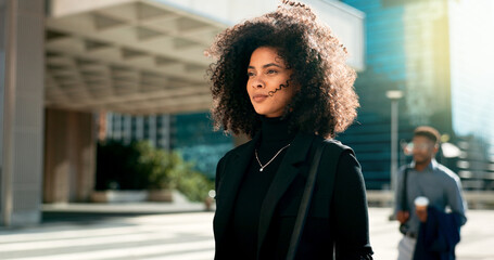 Poster - Professional, black woman and moving by city building with thinking and smile for morning travel or journey outdoor. Happiness, person with afro and corporate worker walking to work in urban town