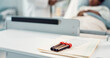 © N F/peopleimages.com - Blood test, glass vial and documents in hospital for surgery, medical research and health for patient in bed. Doctor, medic and sick person in closeup for dna sample, folder or analysis for leukemia