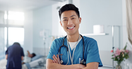 Wall Mural - Healthcare, doctor and asian man with arms crossed at hospital with smile for support, service and wellness. Medicine, professional and expert with happiness and pride for career, surgery or care