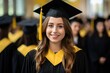 © Oulaphone - Portrait of cheerful young girl in black and yellow graduation gown and cap with other graduate at university.