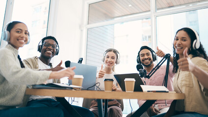 Poster - Men, women and group with laptop, podcast and thumbs up in portrait for success, review or opinion. Team, microphone and headphones for web talk show, broadcast and sign language for emoji at desk
