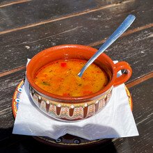 Bowl Of Traditional Bulgarian Bean Soup On A Garden Table