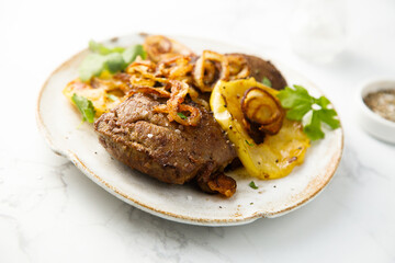 Canvas Print - Roasted liver with apple and onion