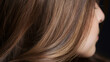 © Cedar - A close up of a brown hair with highlights