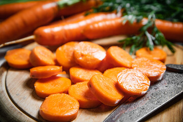 Sticker - Fresh chopped carrots on cutting board.