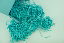 Blue shredded paper for stuffing in a cardboard box fillers for your product placement