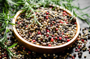 Wall Mural - Peppercorn on rustic background.