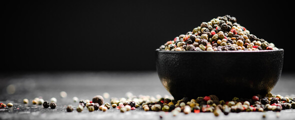 Poster - Peppercorn on rustic background.