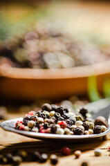 Wall Mural - Peppercorn on rustic background.