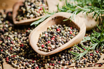 Wall Mural - Peppercorn on rustic background.