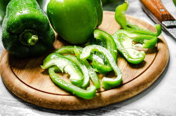 Canvas Print - Chopped sweet pepper. On white table.