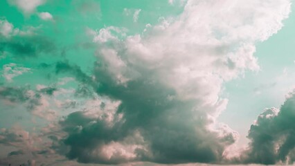 Wall Mural - Clouds Moving In Bold Blue Sky From Day To Dusk Transition Timelapse. Bright Blue Color. Natural Background Sky. Cloud Formation. Transition To Sunset Sky. Orange Sunset Sky Background. Dusk Time.