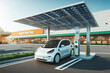 voiture électrique branchée à une borne en train de recharger sa batterie dans un parking de supermarché sous une ombrière photovoltaïque