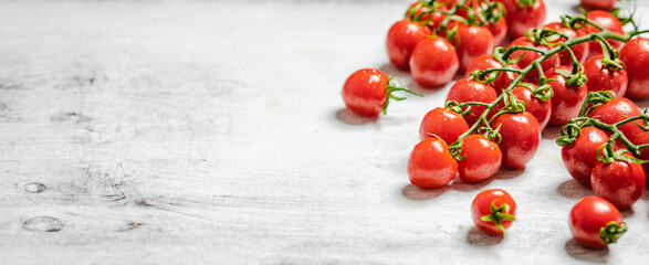 Poster - Fresh tomatoes. On white table.