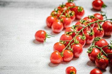 Poster - Fresh tomatoes. On white table.