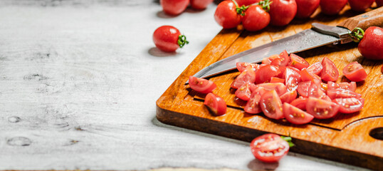 Sticker - Fresh chopped tomatoes. On white table.