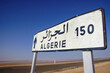 Distance sign on causeway on Chott El Jerid endorheic salt lake in southern Tunisia