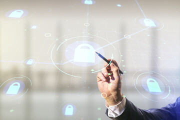 Aufkleber - Developer's hand with pen working with virtual creative lock illustration with microcircuit on blurred office background, cyber security concept. Multiexposure