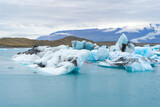 Fototapeta Morze - Jokulsarlon lake in Iceland. Iceland. Ice as a background. Vatnajokull National Park. Panoramic view of the ice lagoon. Winter landscapes in Iceland. Natural background. 