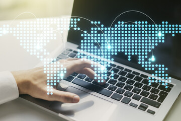 Poster - Abstract creative world map with connections and hands typing on laptop on background, international trading concept. Multiexposure