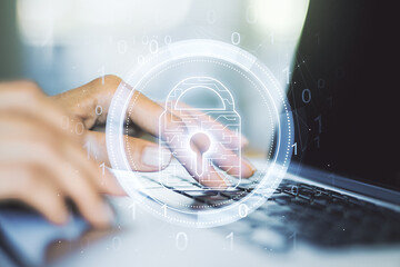 Poster - Double exposure of creative lock hologram with chip and hands typing on laptop on background. Information security concept