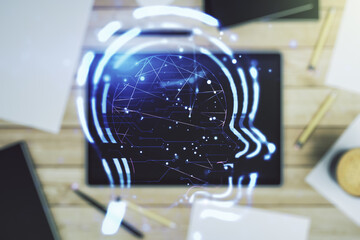 Aufkleber - Creative artificial Intelligence concept with human head hologram and modern digital tablet on background, top view. Multiexposure