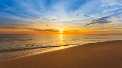 Wall Mural - Beautiful sunset on the beach and natural sea landscape.