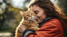Young Woman Hugging Her Cat Outside