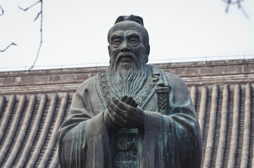 Wall Mural - Beijing, China - April 3, 2013: Statue of Confucius in Guozijian - Imperial Academy in Beijing