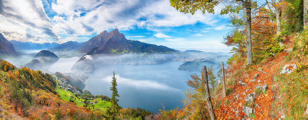Wall Mural - fabulous autumn view of stansstad city and lucerne lake with mountaines and fog.