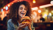 Woman Eating Vegan Meatless Burger in Restaurant